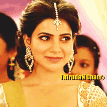 a close up of a woman 's face with a watermark that says ' tirrudan chat ' on it