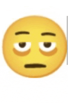 a close up of a yellow smiley face with a tired look on its face .