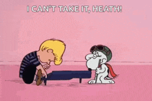 snoopy is playing a piano next to a boy who is kneeling down .