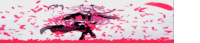 a girl is standing in a field of red petals
