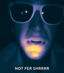 a man wearing sunglasses says not fer shrrrr
