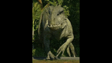 a large dinosaur is standing in the middle of a jungle .