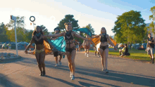 Dancing On The Street Happy GIF - Dancing On The Street Happy Parade Dance GIFs