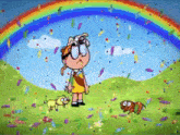 a girl and two dogs are standing in a field with a rainbow in the background
