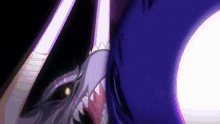 a close up of a person 's face with a shark 's teeth coming out of it 's mouth .