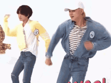 a couple of men are dancing together on a white surface .