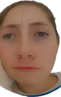 a close up of a woman 's face with her hand on her cheek
