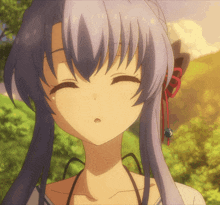 a girl with purple hair and a red ribbon in her hair