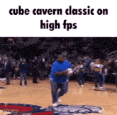 a man is running on a basketball court with the words cube cavern classic on high fps