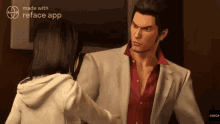a man in a suit is talking to a woman in a white hoodie ..