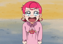 a little girl with pink hair is wearing a pink dress with a heart on it