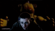 a screen shot of a man with glasses and the name lovelypanda231