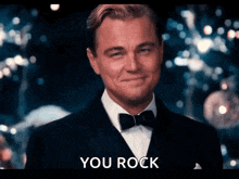 leonardo dicaprio is wearing a tuxedo and bow tie and says you rock