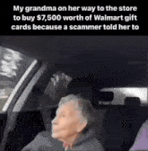 an elderly woman is sitting in the back seat of a car