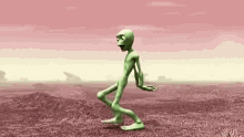 a cartoon green alien is dancing in a desert .