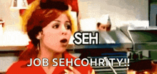 a woman in a red shirt says job seh cohrity