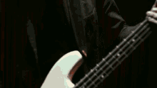 bass headbanging playing the guitar rock on friends house