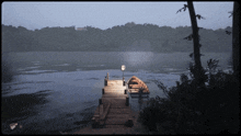 a boat is docked at a dock in the middle of the lake