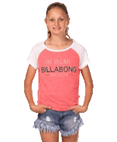 a young girl is wearing a pink billabong shirt