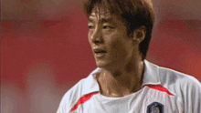 a close up of a man 's face with sweat coming out of his face