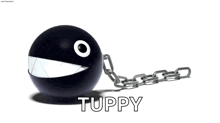 a black ball with a chain attached to it says tuppy