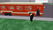a person standing in front of a red bus