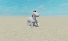 a white horse with a black mane and tail standing in the sand