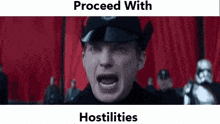a man in a black hat is screaming with his mouth open .