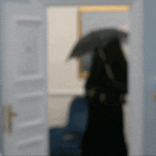 a blurry picture of a person with an umbrella