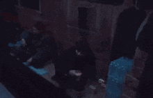 a blurry picture of a man holding a gun