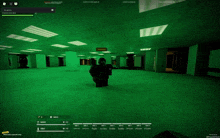 a screenshot of a video game shows a character standing in a dark room