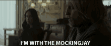 Im With The Mockingjay Jennifer Lawrence GIF - Im With The Mockingjay Jennifer Lawrence Woody Harrelson GIFs