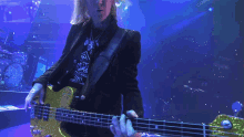 Playing A Bass Guitar Tom Hamilton GIF - Playing A Bass Guitar Tom Hamilton Aerosmith GIFs