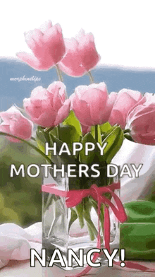 a vase filled with pink flowers with the words `` happy mothers day nancy '' .