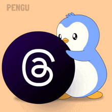 a penguin holding a black ball with a white circle on it