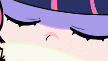 a close up of a person 's face with purple and pink hair