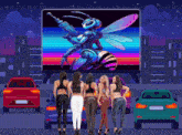 a group of women are standing in front of a screen that shows a robot bee