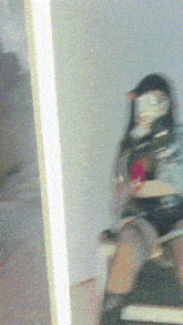 a blurry picture of a person sitting in a chair