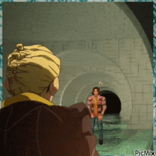 a picture of a man standing in a tunnel with picmix written in the corner