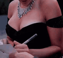 Signing Scarlett Johansson GIF - Signing Scarlett Johansson Red Carpet GIFs