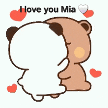 a couple of bears hugging each other with the words `` i love you mia '' written on the bottom .