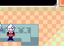 a pixel art character is sitting on a couch .
