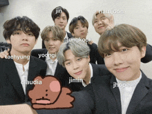 a group of young men posing for a picture with names like jin and namjoon on the bottom