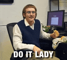 a man sitting in front of a computer with the words " do it lady " written on the bottom