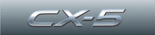a silver cx-5 logo is displayed on a grey background