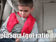 a young boy wearing a red vest is sitting in the back seat of a car with the caption plasma got ratio d
