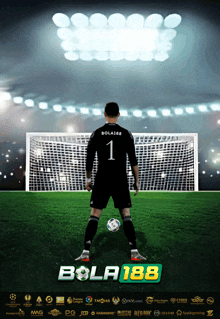 a soccer player with the number 1 on his jersey stands in front of a goal
