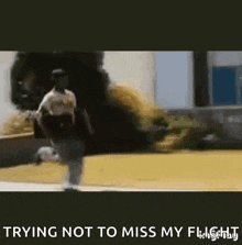 a blurred image of a person running with the words trying not to miss my flight