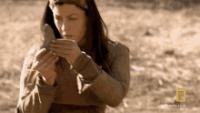 Checking The Stone The Great Human Race GIF - Checking The Stone The Great Human Race Inspecting The Stone GIFs