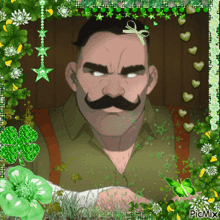 a picture of a man with a mustache surrounded by shamrocks and flowers
